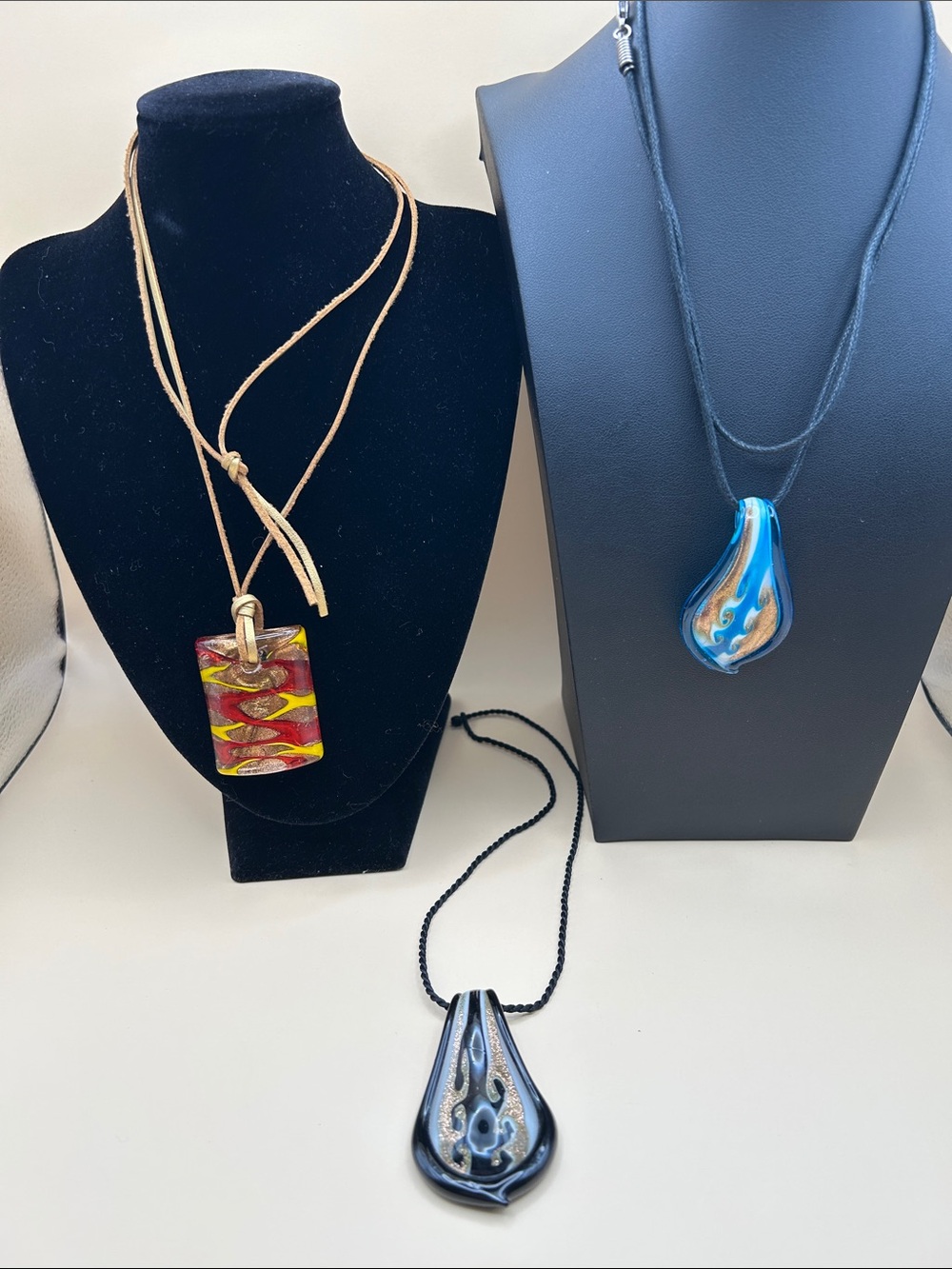 Glass pendant necklace bundle. 3 glass pendant necklaces on fabric cords